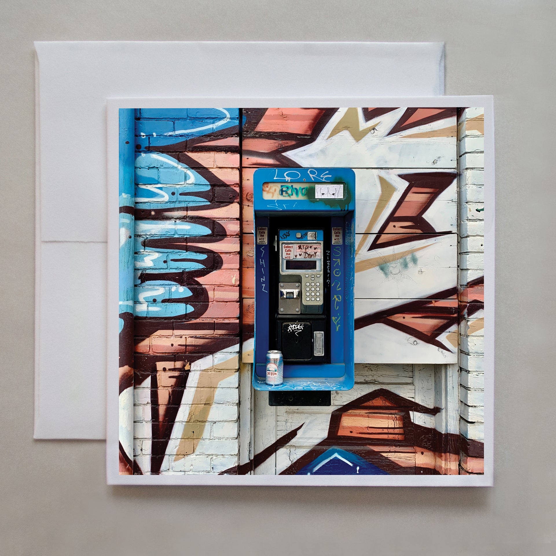 I love how the graffiti artist incorporated the broken phone booth into the design in this photo greeting card by photographer Caley Taylor.